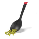 A long-handled stirring spoon with a black nylon head and a red ergonomic handle grip.