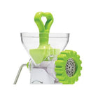 Starfrit brand manual meat grinder featuring a white base, clear hopper, green pusher and turning handle, and a grinding plate.