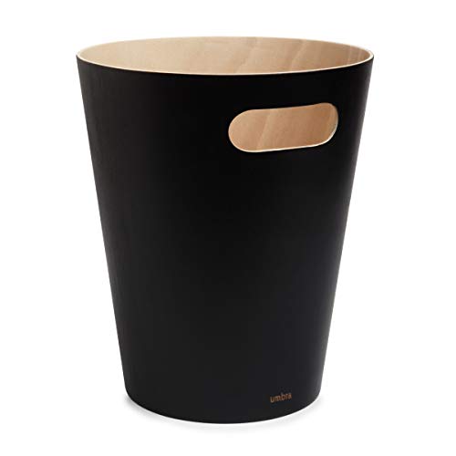 The Umbra Woodrow 2 Gallon Modern Wooden Trash Can is a black, sleek wastebasket featuring a natural wood interior and an oval cut-out handle near the top. Its minimalist design includes a slightly flared shape, making it suitable for any home or office.