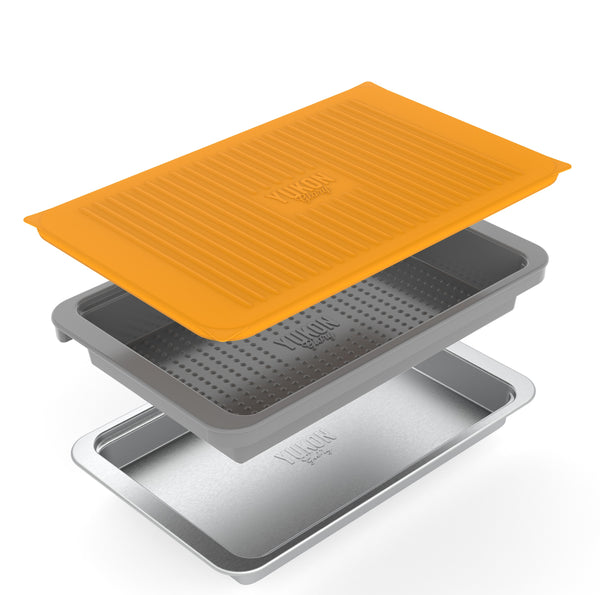 Yukon Glory Grill Prep 'N Serve Set with plastic tray, stainless steel tray, and orange snap-on lid stacked on a white background.