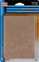 Beige adhesive felt pads for furniture.