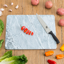 White marble rectangular cutting board from Home Basics, designed for multi-purpose use, including pastry making. The natural veining of the marble is visible.