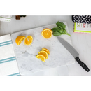 White marble rectangular cutting board from Home Basics, designed for multi-purpose use, including pastry making. The natural veining of the marble is visible.