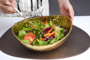 Golden Millennium oval serving bowl, hammered titanium-plated porcelain, 11.25 x 9 x 4 inches.