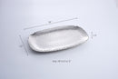 Pampa Bay Millennium large serving platter, showcasing its unique textured silver finish and sophisticated design for serving food.