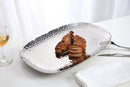 Pampa Bay Millennium large serving platter, showcasing its unique textured silver finish and sophisticated design for serving food.