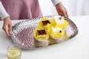 Pampa Bay Millennium large serving platter, showcasing its unique textured silver finish and sophisticated design for serving food.