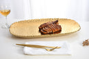 Pampa Bay Golden Millennium large serving platter, showcasing its unique textured gold finish and sophisticated design for serving food.