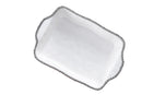 A rectangular, white porcelain baking dish with a dimpled texture and a silver beaded rim.