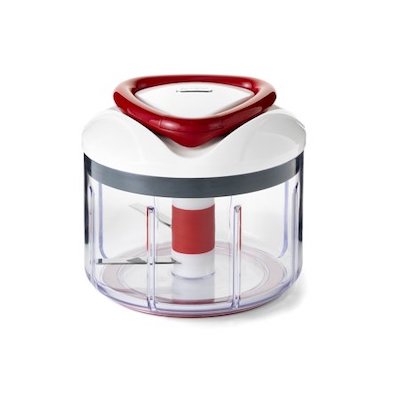 Manual food chopper by Zyliss, featuring a pull-cord mechanism, clear container, and red accents.