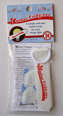 White Kosher Fridge-eez strap with red text and ring for refrigerator use on Sabbath