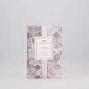 Fragrant Greenleaf Haven sachet, a herbal musk aromatic envelope with a contemporary gray, pink, and cream fan design on the packaging.