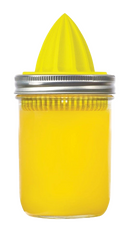 A yellow Jarware juicer lid attachment for a wide-mouth mason jar. It has a ridged reamer in the center and a strainer around the edge.