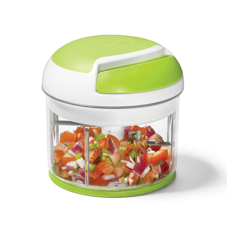 Starfrit Pull Chopper with transparent bowl, green pull handle, and stainless steel blades displayed on a white background.