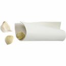 A cream-colored, flexible silicone tube garlic peeler shown with two peeled garlic cloves and one clove being peeled inside the tube.
