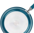 Blue nonstick frying pan with stainless steel and silicone handle displayed on a white background.