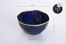 Porcelain serving bowl, 8.5 inches wide and 5 inches deep, Sunset by the Sea navy blue with gold rim.