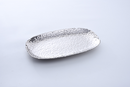 A 14-inch rectangular serving platter with a shiny silver, hammered texture and an irregular, wavy rim.