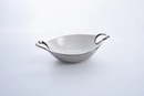 White oval baking dish for gratins and casseroles, with curved handles.