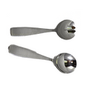 A 2-piece salad serving set consisting of one spoon and one fork/claw, both made of polished stainless steel with ridged, textured handles.