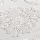 The fabric features a raised, woven or embossed pattern in white against a slightly different shade or texture of white, creating a subtle visual effect.