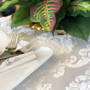 The fabric features a raised, woven or embossed pattern in white against a slightly different shade or texture of white, creating a subtle visual effect.