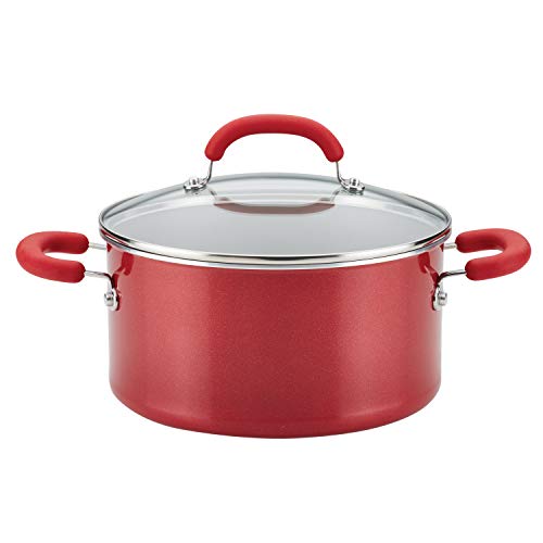Red 6-quart nonstick stock pot with glass lid and stainless steel-silicone handles, displayed on a white background.