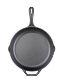 Black cast iron skillet with a long ergonomic handle and helper handle, featuring a smooth cooking surface and dual pour spouts.