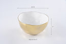 White and gold porcelain serving bowl, 8.5 x 5 inches.