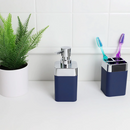 Home Basics Skylar 10 oz. ABS plastic soap or lotion dispenser in a sleek navy blue color with a polished chrome pump mechanism.