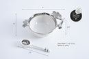 A two-piece serving set featuring a small, round white porcelain bowl with an ornate silver metal pomegranate-shaped trim, and a matching white and silver serving spoon.