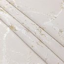 jacquard napkins in a marble white and gold pattern