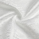 off-white jacquard napkin shown on a white background.