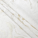 white jacquard napkins with an elegant gold wave pattern