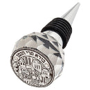 crystal wine cork displayed on a white background.