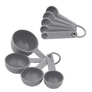 Gray 9-piece measuring cups and spoons set with soft-grip handles and easy-to-read markings