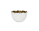 Godinger Munro white ceramic fruit bowl that has a simple, rounded, and slightly shallow shape. The Rim is irregularly shaped with hand-hammered gold interior.