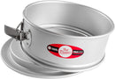  A 10-inch round anodized aluminum springform pan with a pedestal base and stainless steel latch shown on a white background.