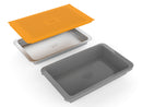 Yukon Glory Grill Prep 'N Serve Set with plastic tray, stainless steel tray, and orange snap-on lid stacked on a white background.