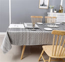Rectangular dark silver jacquard zigzag tablecloth on a table