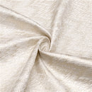 Rectangular gold jacquard zigzag tablecloth laid flat on a white background.
