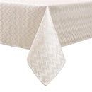 Rectangular gold jacquard zigzag tablecloth laid flat on a white background.